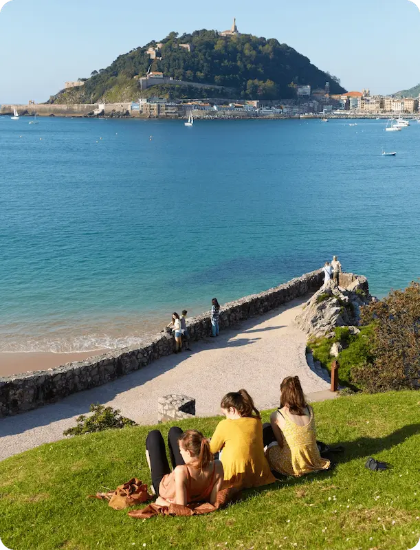 Girls in the Miramar gardens facing the beach